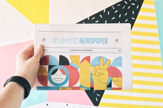 A design of a newspaper paper with a headline and some eye-catching illustrations